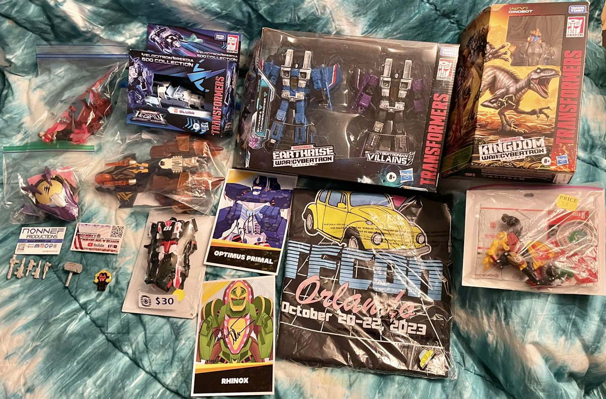 J03y_K10's tweet photo. My haul from my time at #TFCon with my friend @RedRangerChris today!  Absolutely wonderful time at the event.  Shoutouts to @PatriotPrime73, @TJOmega, &amp; @NonnefProd for the freebies!  Another shoutout to @engineerhoist for the Wreckers Hammer, such a good piece! https://t.co/geTtcTNMWX