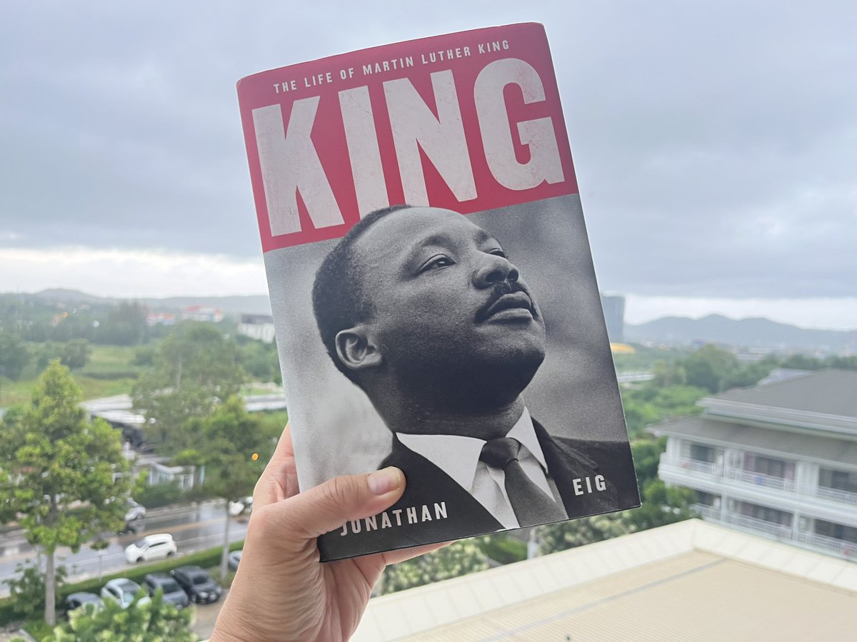 CurtisSChin's tweet photo. #USA or #SoutheastAsia: the #book covers might look different, but get your hands on this #curtischinbookclub selection: #KingALife by @jonathaneig.

Catching up on my #reading &amp; #KhaoTomPla (rice soup w/ fish) on a #rainyday on the Gulf of Siam. 

#MLK #BelovedCommunity #justice https://t.co/yTUmaSNLq7