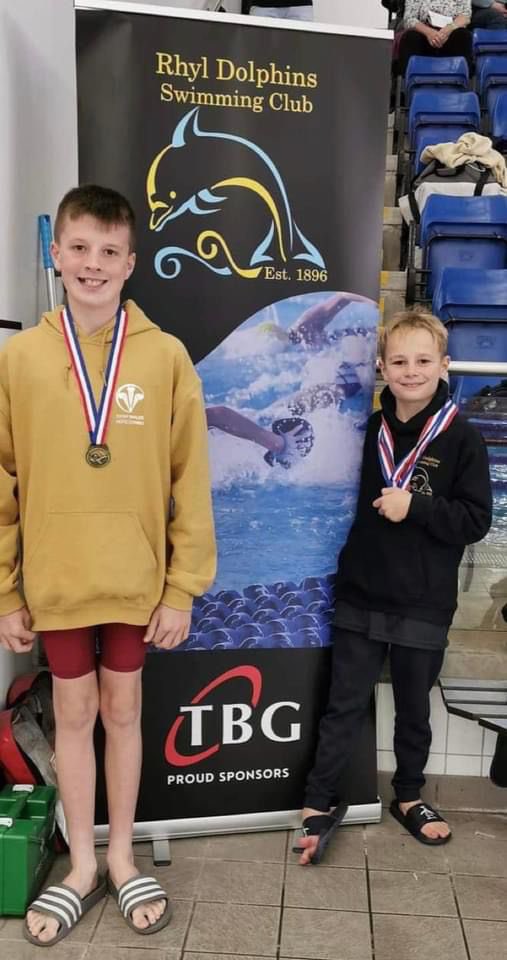 gaznuts's tweet photo. Well done to Thomas and Harri yesterday at the Autumn meet in Llandudno. Thomas came away with 2 gold medals &amp; Harri a silver and 3 bronze. Fantastic swimming both of you. Good luck today! A special thanks goes out to our sponsors @TBrownGroup for our new banners @RhylDolphinsSC https://t.co/GkIs60u5dR