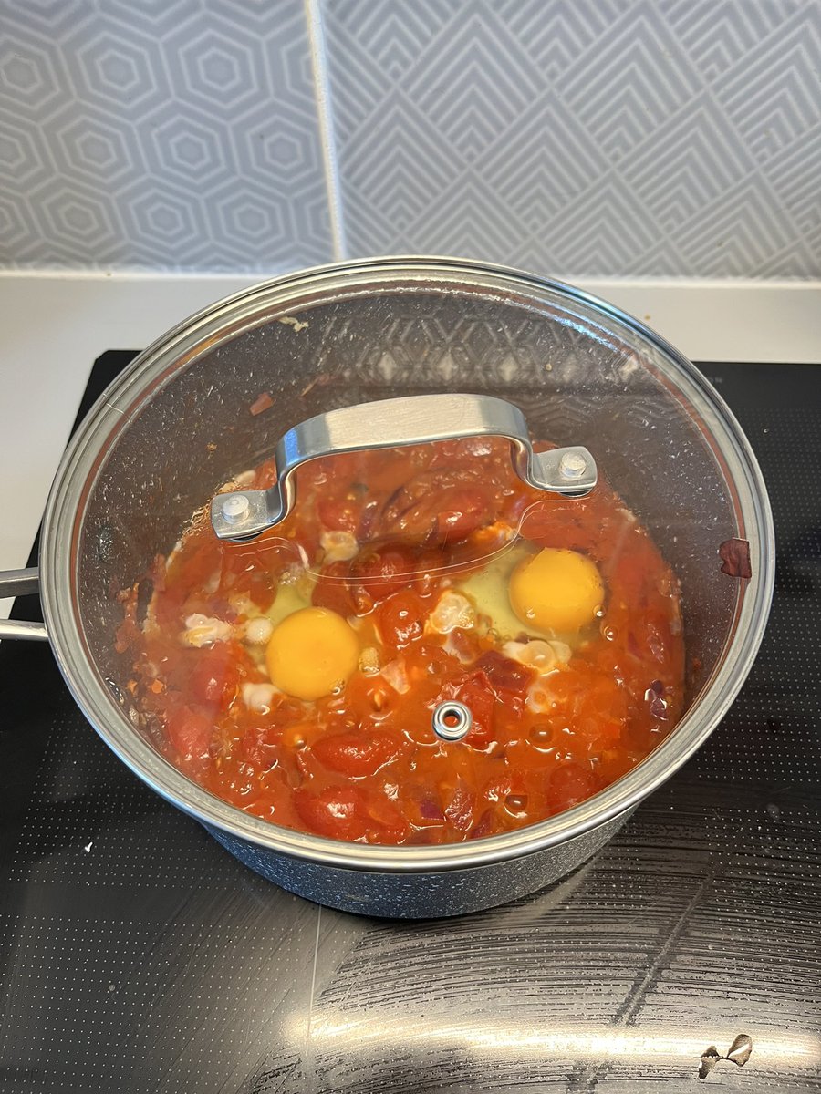Shakshuka breakfast cooking underway