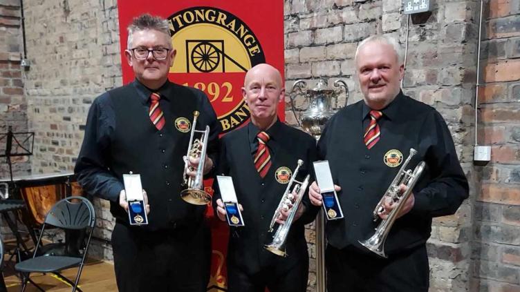 NittenSilver's tweet photo. Congratulations to Kenny Crookston, Graham Fletcher &amp; Angus Edmond (l-r) receiving their @TheSBBA Life Medals marking 50 years service to brass banding. Thanks @BrassBandsEng for the fantastic article. 

@EoSbba @broxlivi_band @whitburnband @TheFaireyBand @fodensband @DesfordBand https://t.co/6OfEfXX0YO