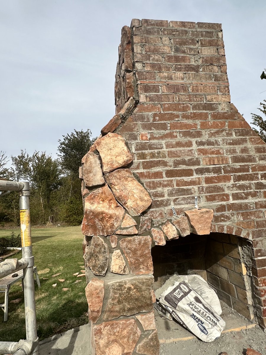I’ve been working on this outdoor fireplace for 6 months. Rock was from fallen barn our family owns. It’s taken all of my brain power to build it.