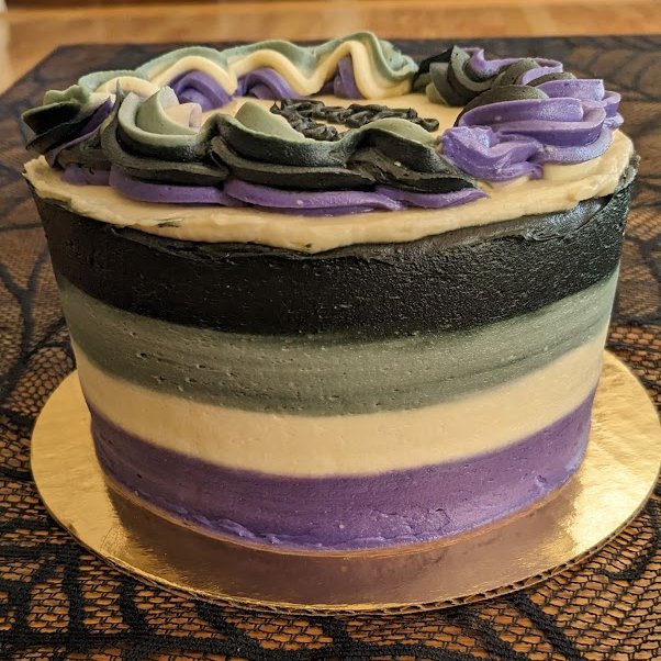 The_Ace_Couple's tweet photo. Happy #AceWeek! We've got our cake and we're ready to dig in! 🖤🤍💜
#AceCake #AceWeek2023 #Vegan #MudPieBakery https://t.co/6gtyFaClWs