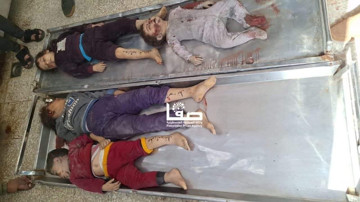 Emelia8z0's tweet photo. A message to the silent world: Don't overload Gaza's children beyond their capabilities. Yesterday they wrote their names on their hands and feet so they can be easily identified, and today they were martyred in the bombing of Gaza by Israeli occupation 💔
#Stop_the_bloodshed_in_Gaza 
#SavePalestineSaveHumanity