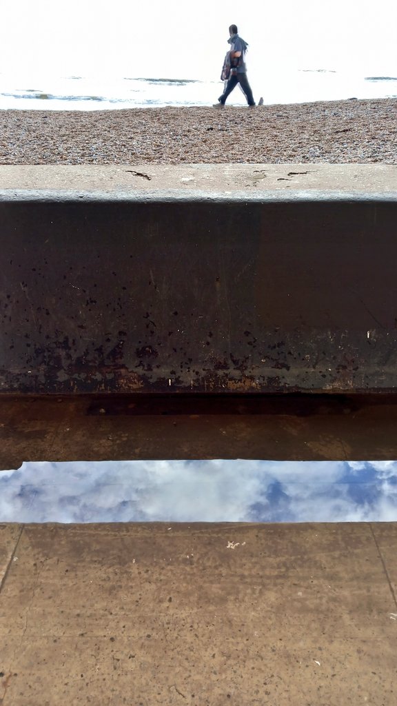 Concrete, water, sky, shingle, human.