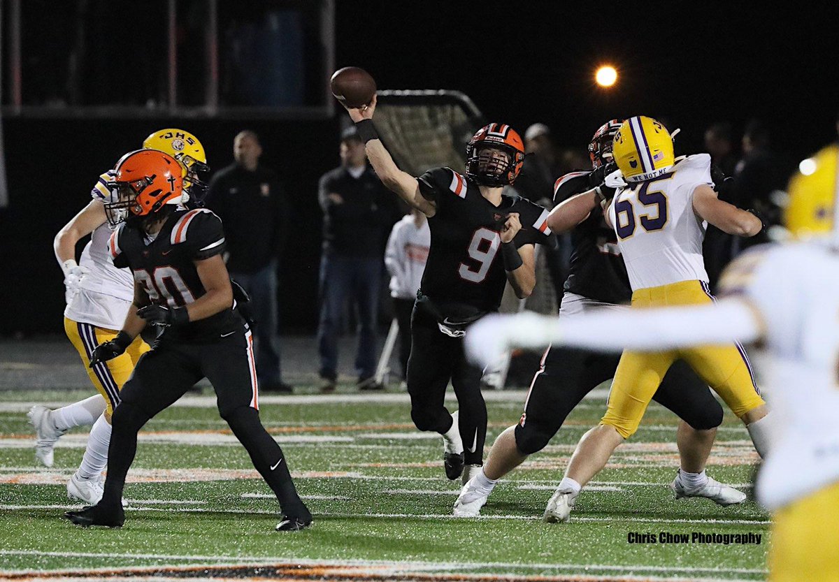 Hoover QB Carson Dyrlund (#9) passes the ball. Hoover wins 27-14 over Jackson