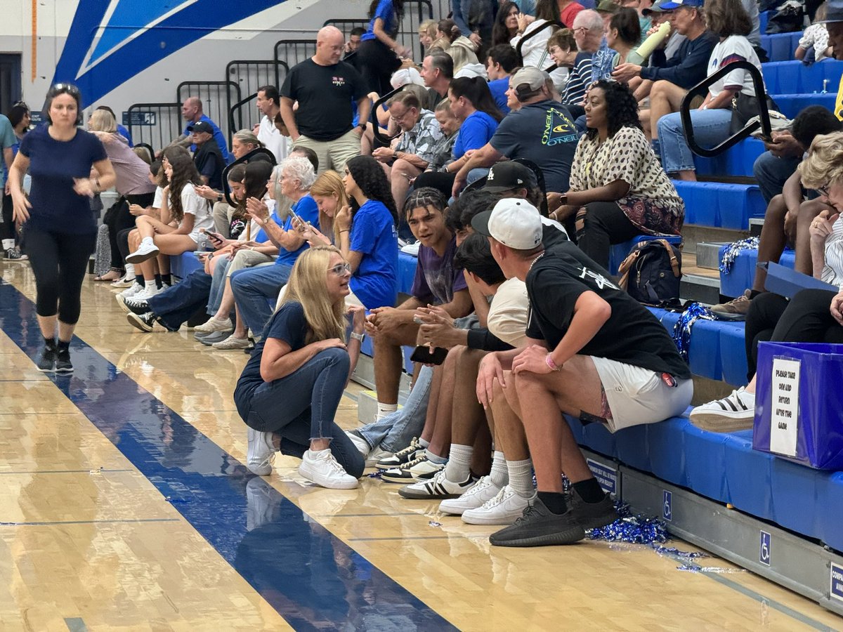 Redlands High School Principal Kate Van Leuven (Class of 1993) uses a break between sets at Dana Hills High School as a teachable moment to educate the Terriers who have made the Trek to Dana Point. #longblueline #GoTerriersGo