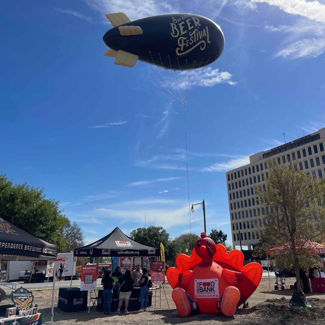 safoodbank's tweet photo. We want to thank the San Antonio Beer Festival for inviting the San Antonio Food Bank as the benefiting charity. 🍻 We had a blast promoting our Turkey Trot 5k with the community! 🏃‍♂️ Thank you to everyone who stopped by our booth and took a picture with our giant turkey! 🦃 https://t.co/lwopPJhZYB