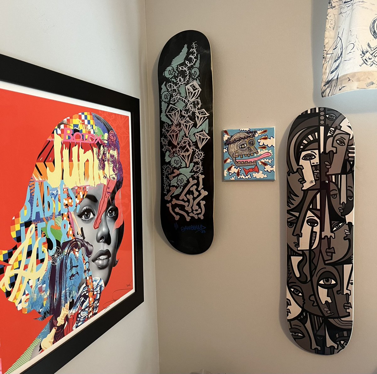 Made some updates to the home office gallery💥 My signed @Gemma_NFT by @tristaneaton looks really good next to my 1/1 @eddiegangland skateboard deck, 'The Chosen One' from 2021 by Eddie Gangland, and @TheStoicsNFT skateboard deck by @GabrielJWeis 🤌