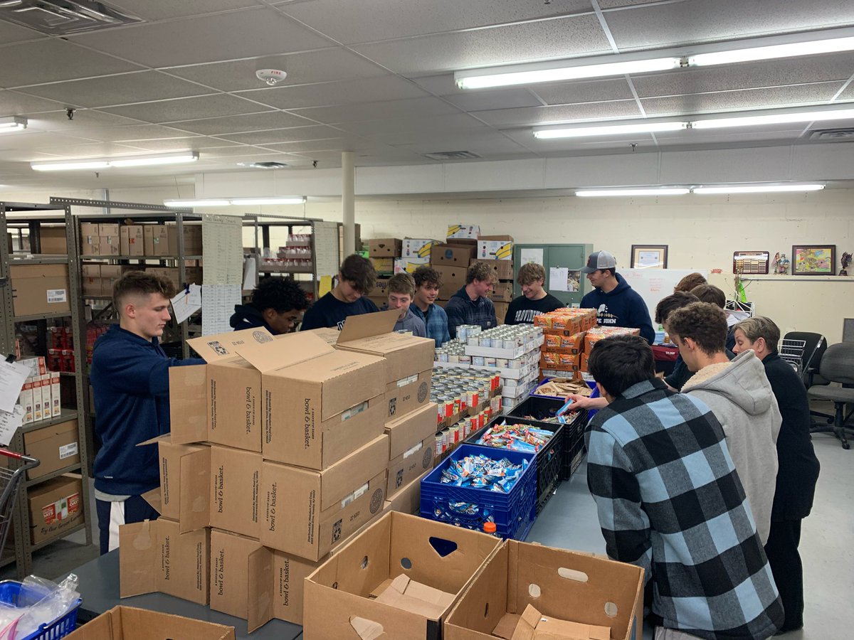 PopeJohnLionsFB's tweet photo. Got to serve our community today and help bag food at our local food pantry. Proud of these gentlemen for being an Honor to the Father! Shoutout to the Oroho family for helping to set this up. #wearepopejohn https://t.co/Zzw94KaT3d