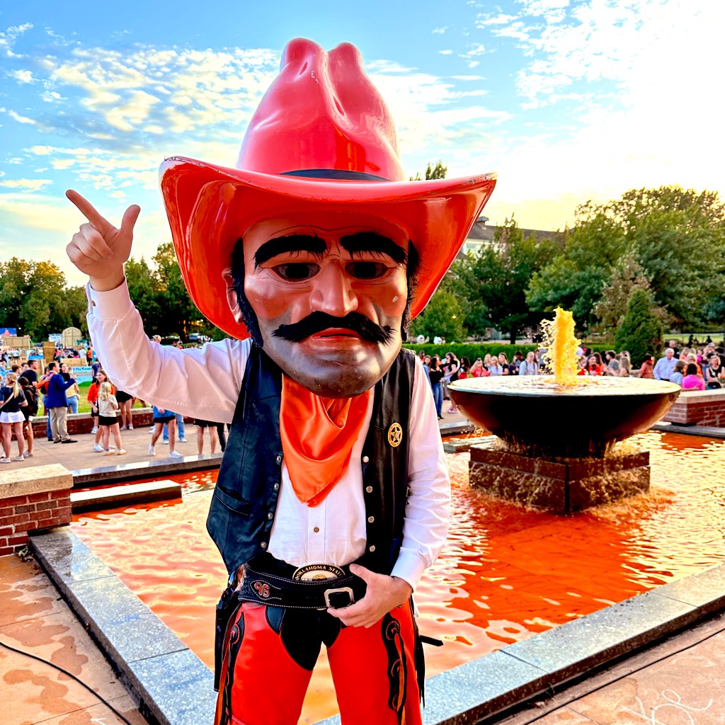 OKStateAlumni's tweet photo. Nobody does tradition like Oklahoma State. 🤠

America’s Greatest Homecoming celebrating Pistol Pete and ‘The Year of the Cowboy’ is underway with the dyeing of the library fountain!

https://t.co/dSbPBEY7lg | #okstatehc https://t.co/sSaPe3WrZH