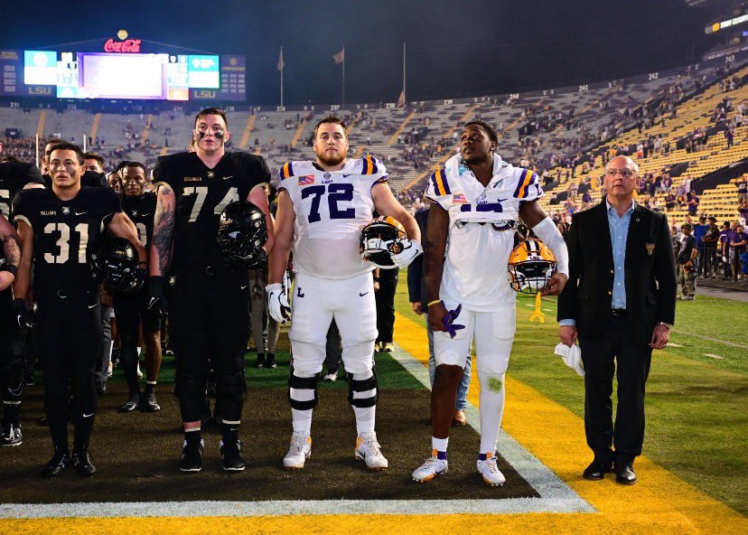 rhinoo71's tweet photo. Simon #74 and his cousin Garrett #72 after the Army/LSU game Saturday night in Death Valley. @SniderFB @SniderAthletics @260sports @GlennMariniWANE @BrettRumpSports @jkennyOPS https://t.co/6utsZu3bUy