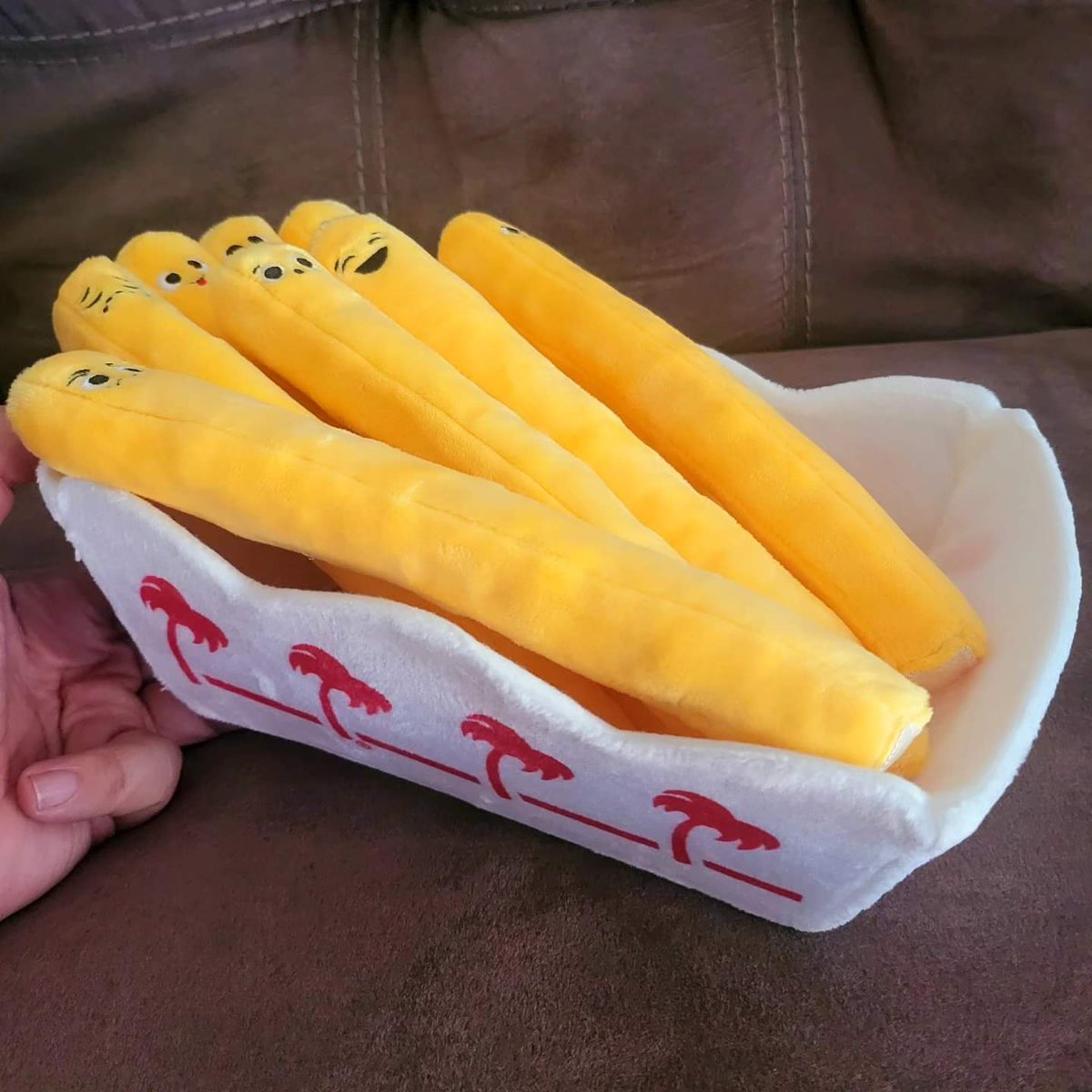 Bought a 75th Anniversary shirt, a cute fries shirt and plush