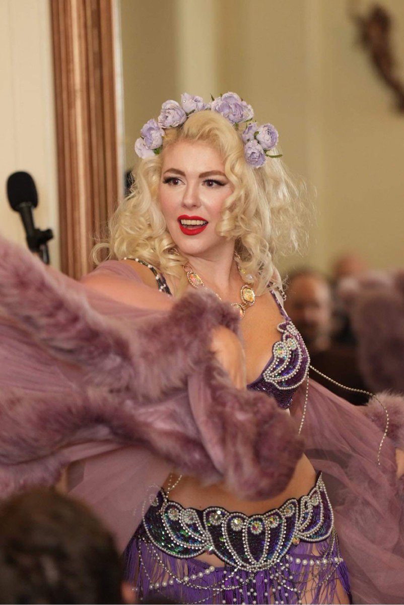 Please enjoy an unedited red eye photo from my show that so many people came to we brought more chairs from the basement and the bar sold out