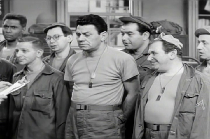 RandCaps's tweet photo. Colonel Hall orders Bilko to get an audience for a lecture on music. Turns out it's a friend of the Colonel's wife, and the audience can bet on how many "twitches" she'll make! #musiclecture #twitches #betting [From The Phil Silvers Show, Ep: "The Twitch," (Tue, Dec 13, 1955)] https://t.co/yjv9Sf0Bqb