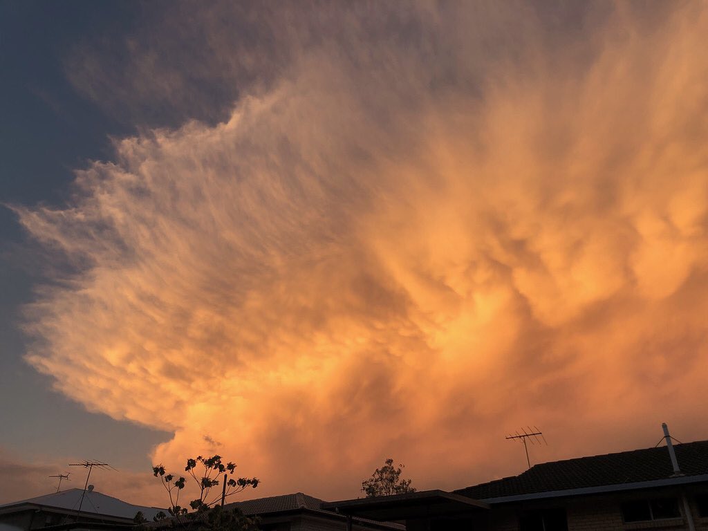 Spectacular #sunset in the skies over #brisbane here a short time ago as the setting sun lit up the back end of a decaying t/storm in fiery orange colours