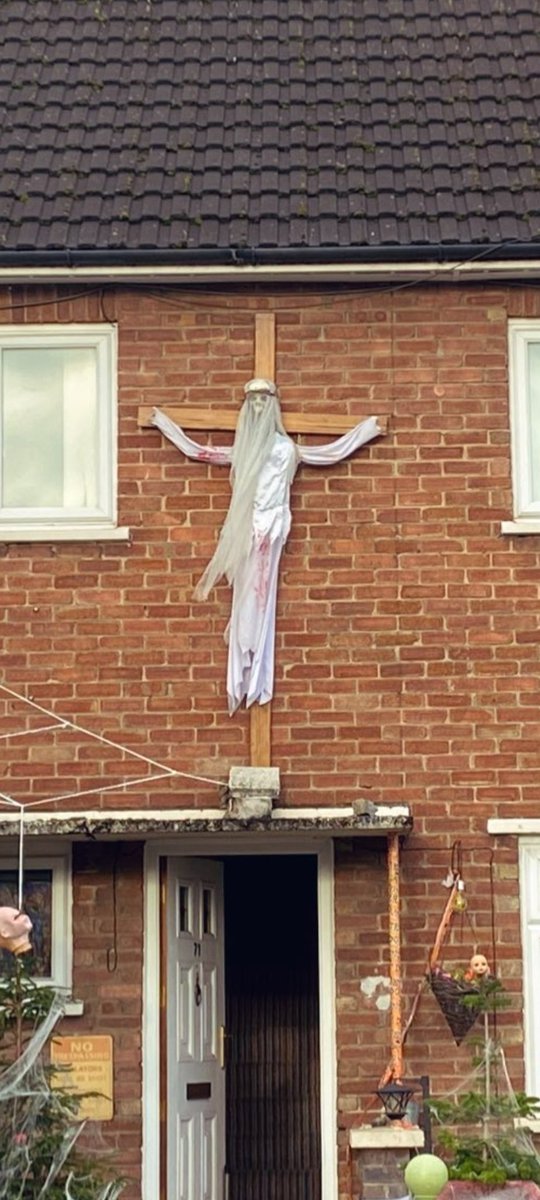 Dad, what are you doing? 

Putting spooky jesus on the cross, son. 

Love Cardiff.