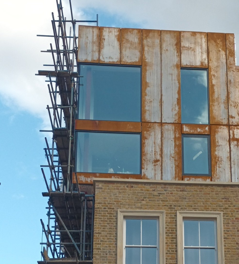 Another 2-storey upwards extention for Shoreditch - this one with an unusual overhang.