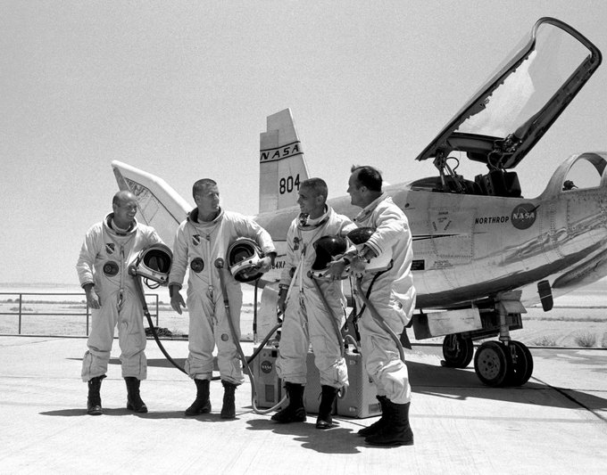 The four principal HL-10 pilots are seen here with the lifting body aircraft. They are, left to right; Air Force Major Jerauld R. Gentry, Air Force test pilot Peter Hoag, and NASA pilots John A. Manke and Bill Dana. All are wearing the pressure suits needed for flying above 50,000 feet.