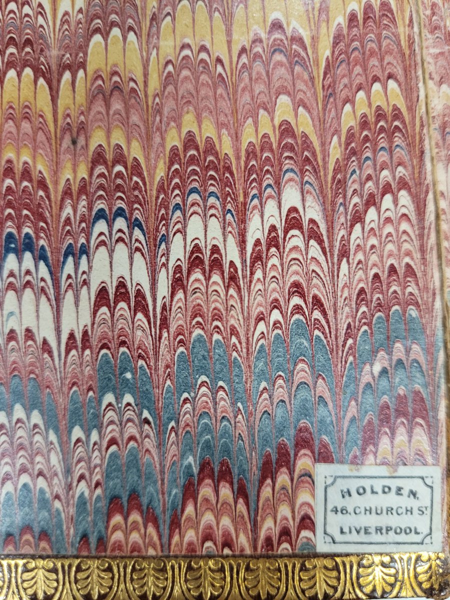 jordan_library's tweet photo. Happy #MarbledMonday! Today's post includes a bonus b8nders ticket "Holden 46 Church St Liverpool." From In memoriam, London, 1855. #MarbledEndpapers #SpecialCollections #MarbledPaper https://t.co/OqlDZ6KpMZ