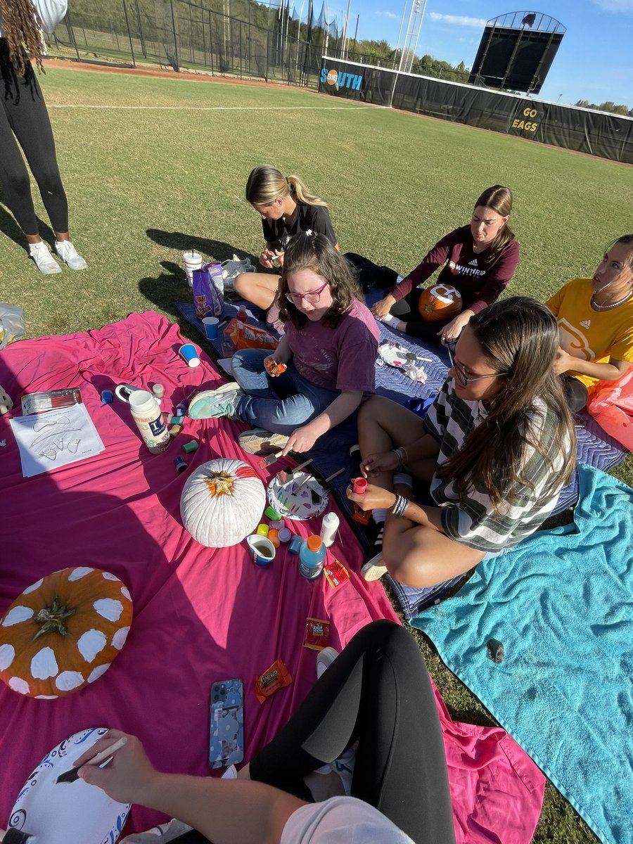 Winthropsoftbal's tweet photo. Today was a blast! We painted pumpkins with Addison, our Team Impact player, at Terry Field! 👻🎃🥎

#WUon2 | #ROCKTHEHILL 🤘🏼 https://t.co/pHR2GUlh6C