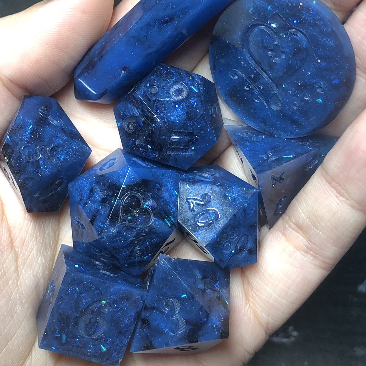 HealersHug's tweet image. Infected Kollari dice set. This set is based of off one of my own characters in a Hollow Knight campaign. The numbers on this set will be inked a bright orange to signify the infection. 
#handmadedice #dice #diceset #dnd #dungeonsanddragons #ttrpg
