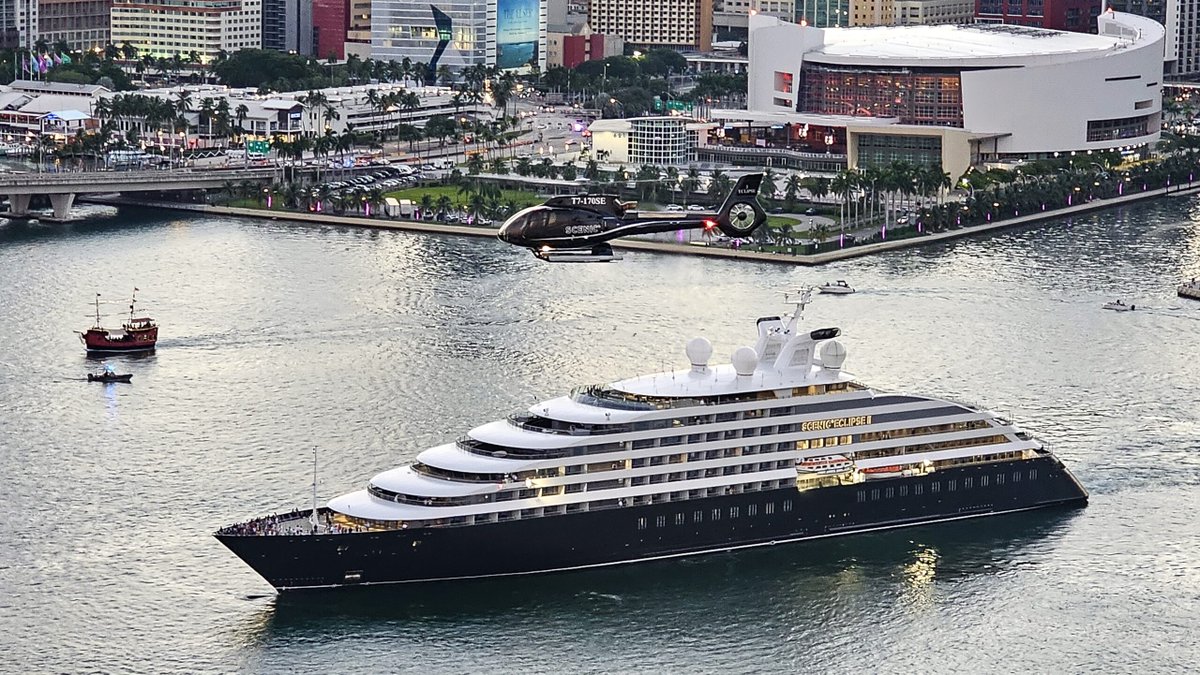 KenMuskat's tweet photo. Amazing shot of @ScenicLuxury #ScenicEclipseII sailing from @PortMiami with one of her #helicopters hovering right above @CLIAGlobal @nbc6 @KrisAndersonTV https://t.co/bxlk6qiWl4