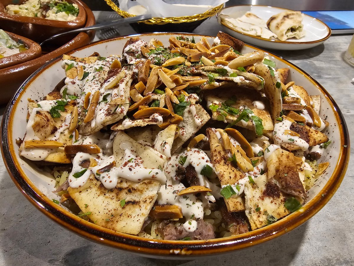 jsmooth995's tweet photo. There's a Palestinian restaurant here named Ayat that's been getting a bunch of one-star reviews and I'm here to tell you: these people are lying about some GOOD ass food https://t.co/mrqEEX5I0P