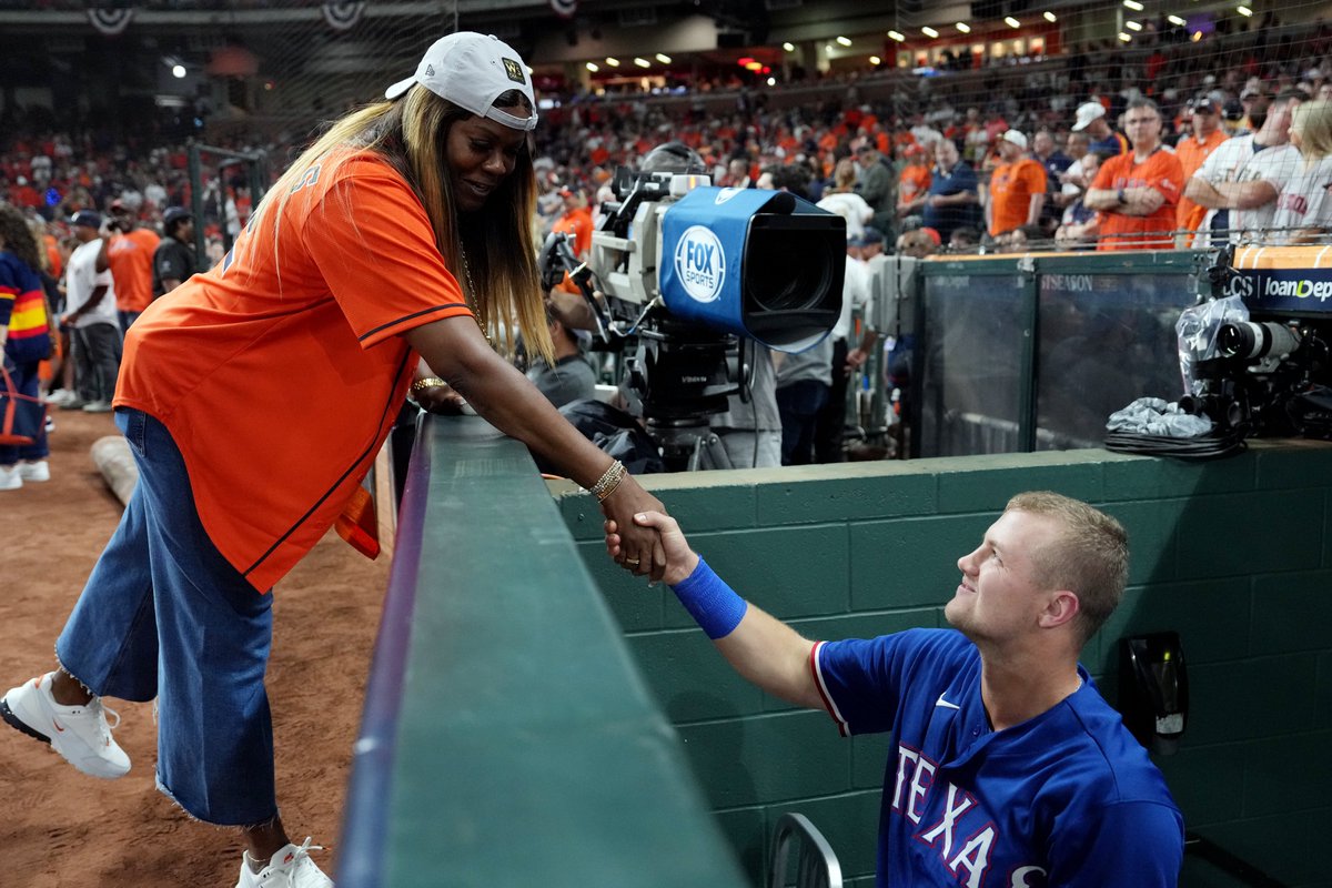 Chron_MattYoung's tweet photo. Missed this photo from Game 6. Sheryl Swoopes walking over to the Rangers dugout to say hello to fellow Texas Tech legend Josh Jung.  (photo by @TherealAlexBDH) https://t.co/R9bZIooG77