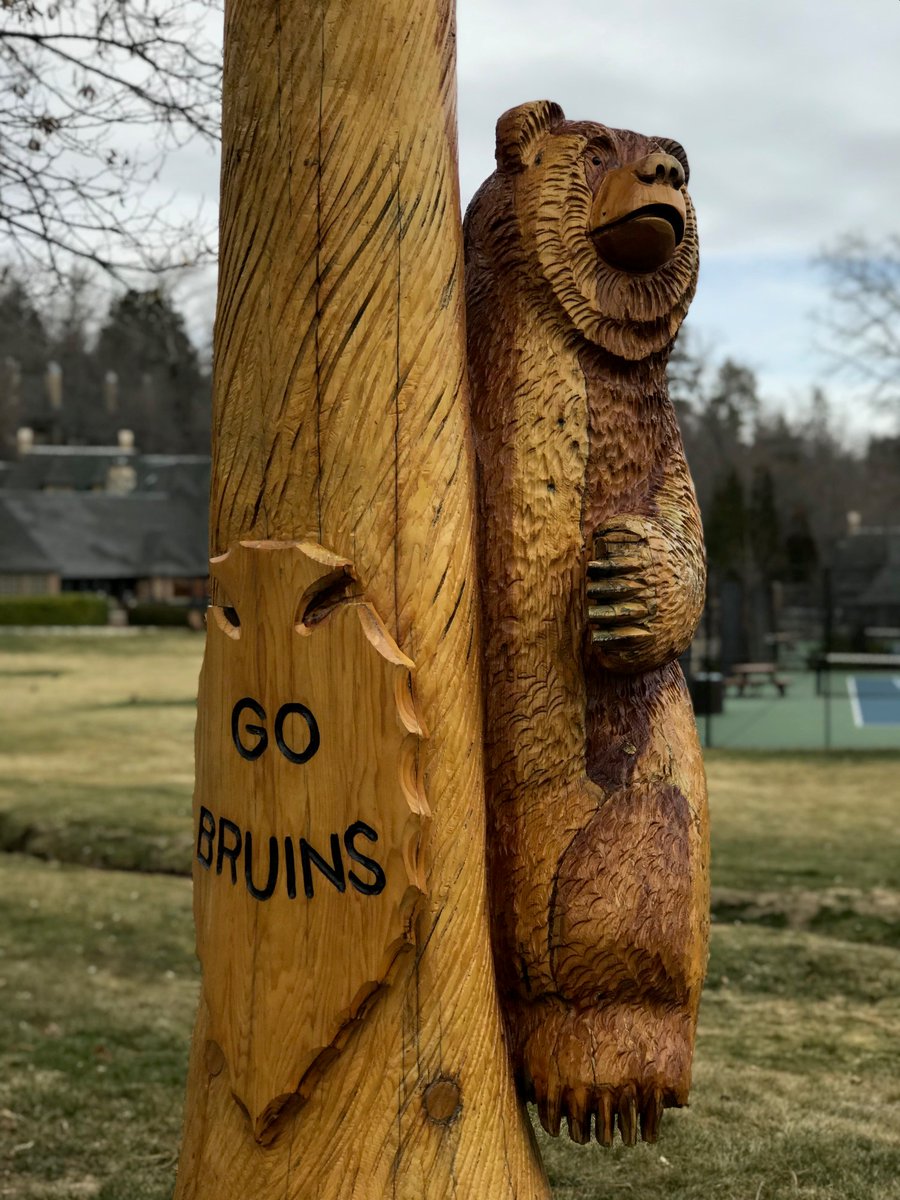 The UCLA Bruin Bear Totem Pole, a steadfast guardian of the entrance to UCLA Lake Arrowhead Lodge, always offers a warm welcome to all our guests! 🐻🌲 #UCLALodge #BruinSpirit'