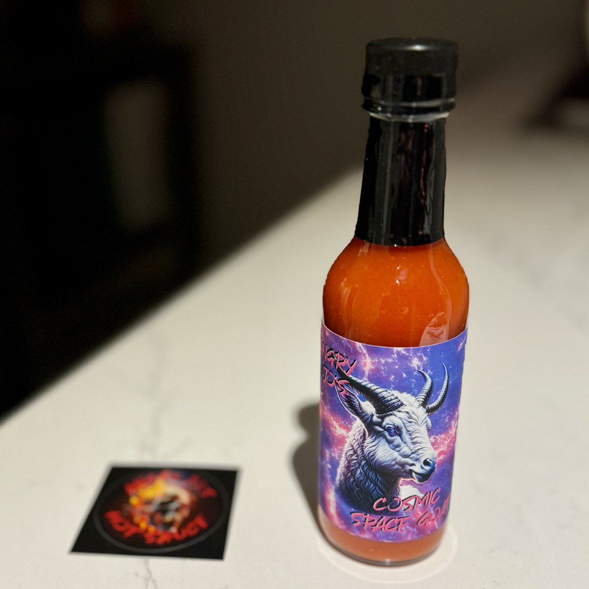 RyanVoutilainen's tweet photo. Well this is a great thing to come home to… @attila_thefun aka #AngryJo’s Cosmic Space Goat #hotsauce!! 🐐🌶️

Can’t wait to try it!! 😋🥵

#AngryJosKitchen #homemade #HomemadeHotSauce #BurnBabyBurn https://t.co/MzAupWxVb0