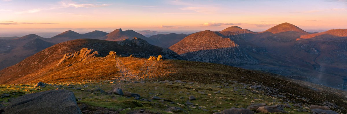 A pano sunset of the Mournes from Slieve Binnian. 
@barrabest @discoverirl @DiscoverNI @NationalTrustNI @EnjoyTheMournes @NTMournes