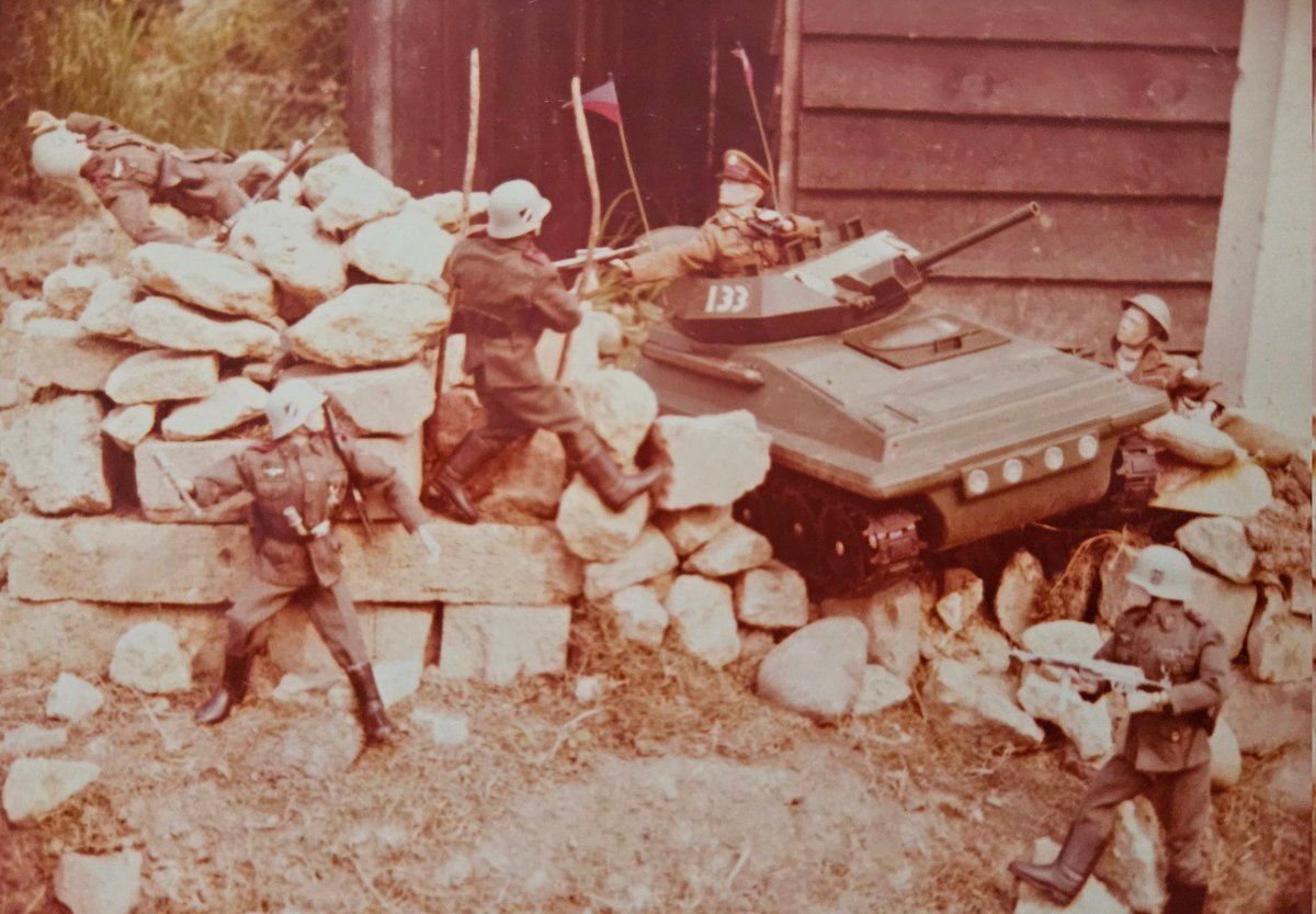 SpitfireFilly's tweet photo. Just got shown this (literal) blast from the past by Dad - some pictures of him playing with toy soldiers as a kid in 1973! Don't fancy a Stielhandgranate at that close range π feel free to share your own #BackyardBattles from childhood...with written explanations, of course! https://t.co/EVmyWrhEDM