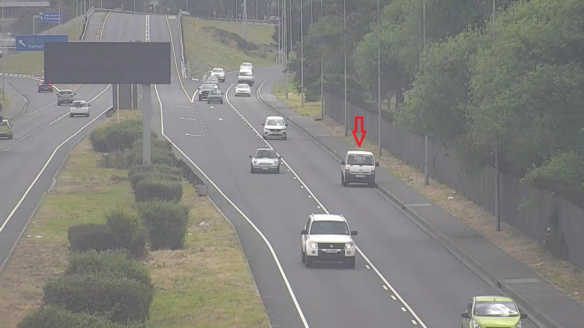 Stationary Vehicle on Airport Approach Rd direction Airport after N2