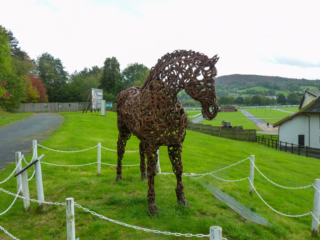 “Fire and Passion” Standing proudly on the  bank of the Royal Welsh showground
Using over 700 horse shoes the sculptor Robert Rattray has totally captured the spirit of the welsh cob stallion – a breed that is world renowned @ItsYourWales @royalwelshshow #peoplewithpassion