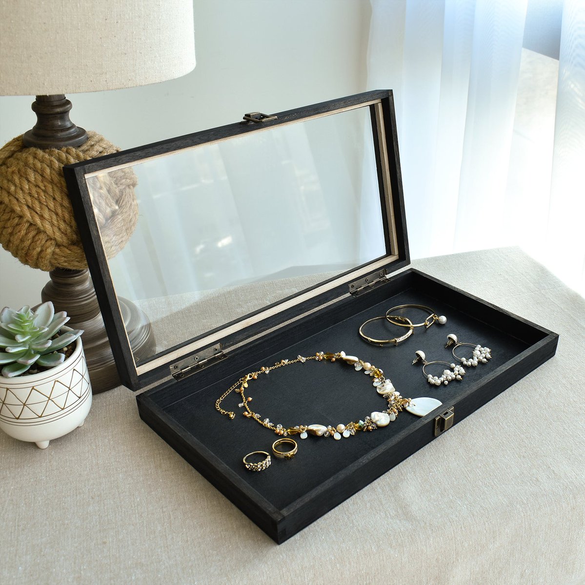 Nilecorp's tweet image. Elevate your jewelry storage with our Handmade Wood Jewelry Case. Perfect for organizing your accessories. #JewelryStorage #AccessoriesCase #HandmadeStorage #WoodenJewelryCase #AntiqueFinish #GlassLid #OrganizeAccessories #JewelryOrganization #StorageSolution #ElegantJewelryCase