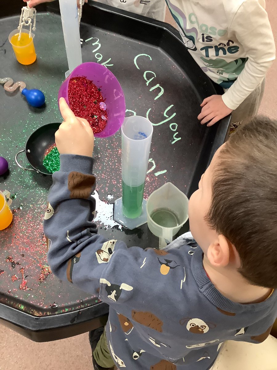 RedRobins_Cald's tweet photo. Can you make a potion? Lots of mixing, squeezing and measuring going on in the tuff tray today! #exploration #earlyyears #nursery https://t.co/5sX6nZRZ9p