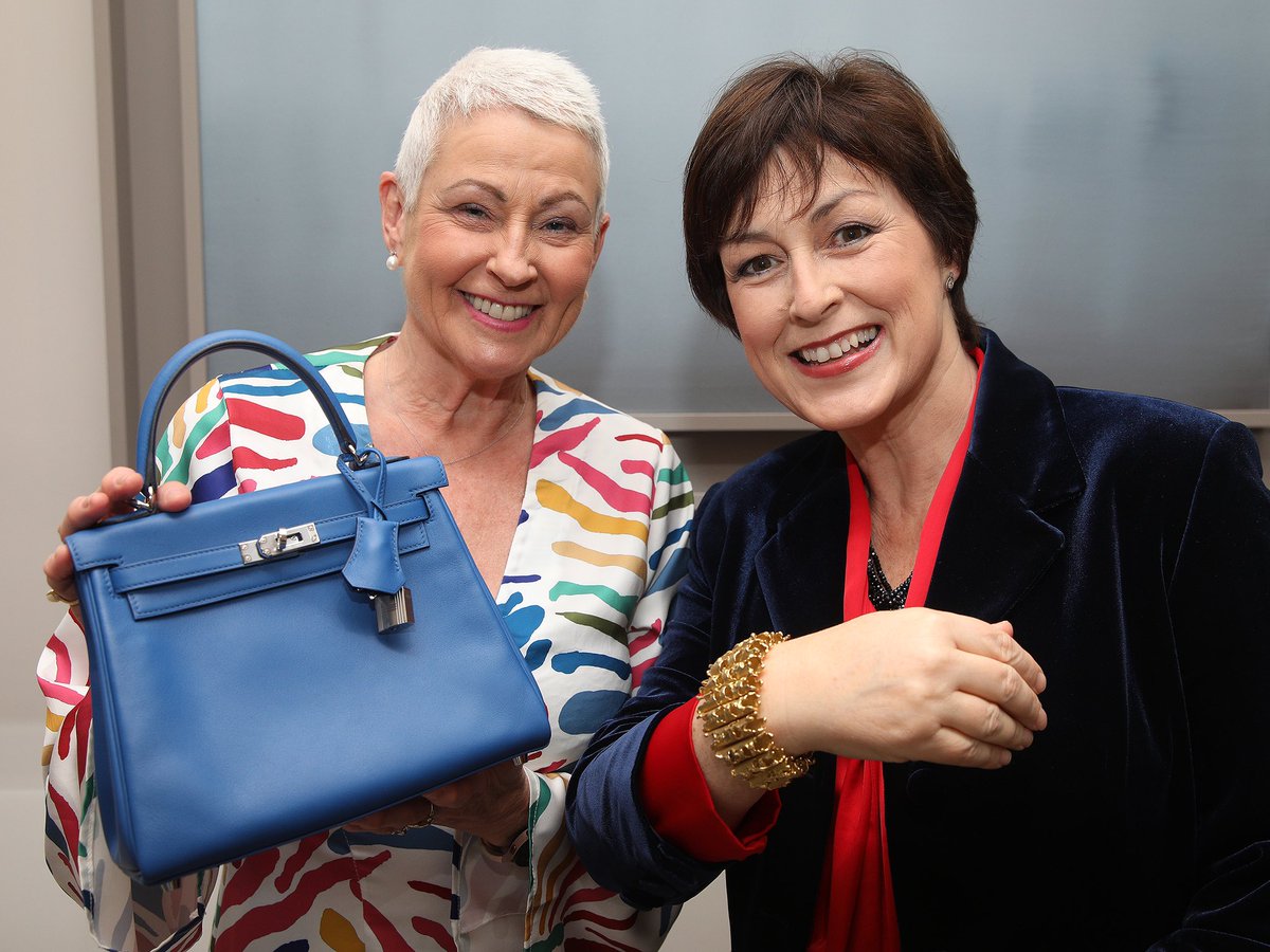 DonnaTraynorTV's tweet photo. Two willing models at Ross’s Auctioneers &amp; Valuers as it celebrates one hundred years in business. An Elizabeth Taylor bracelet &amp; Hermès handbag are included in one of its centenary collections. Birthday girl  @pamballantine

https://t.co/zFUT1n6f5K https://t.co/zuRKEQBX5y