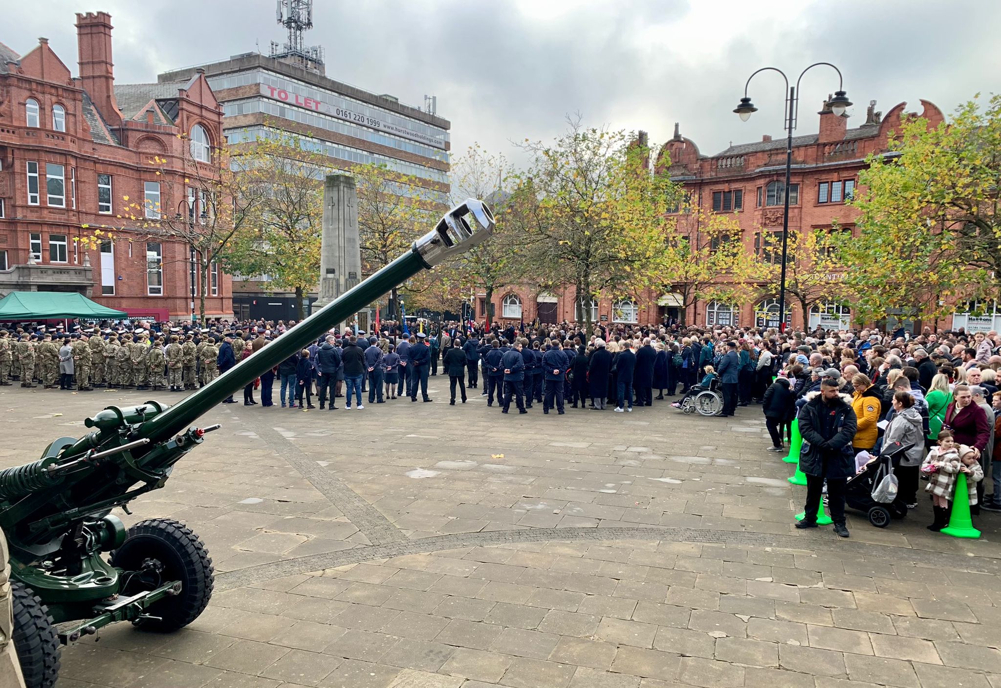 Crowds gather in Victoria Square for a Remembrance Sunday service 