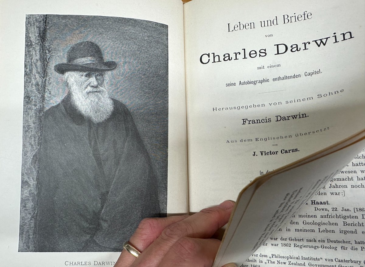 MPIforBI's tweet photo. Embracing the legacy of scientific inquiry! 📚 On #WorldLibraryDay, here’s a peek on a real gem in our library: an 1880s edition of the collected works of Charles Darwin, which marked a milestone in evolutionary biology.
#MaxPlanckHistory @maxplanckpress