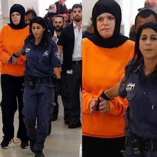 saraadas's tweet photo. This picture is of a Palestinian woman named Israa Jaabis, a prisoner in the Zionists occupation prisons.

She is the mother of a child named Moatasem.

Esraa was lovely happy Plastenien woman she was just moved on a new home with her child and her husband She bough gaz tupe & tv and other things for her new house & Esra arrived near a Zionists military checkpoint suddenly they shot on her car, gas tube caught fire & her car start to burn, the fire reached her body (60% of her body).

 Zionists prevented any one from providing assistance & they prevented the ambulance from treating her, they took her out of her car after it was consumed by fire.

 They dragged her into the street and took off the rest of her clothes & they beat her, they interrogated her while she was screaming in pain &  they arrested her, without charges, they denied her treatment. Israa was disfigured, She was deprived of her only child, Moatasem.

 Because the fire consumed her nose
 and she can't breathe from it
 she lost her hands and was injured badly.

She lost her home, her joy, and the sight of her son growing up in front of her eyes!

Till today, Israa is a prisoner in the occupation prisons since 2015.