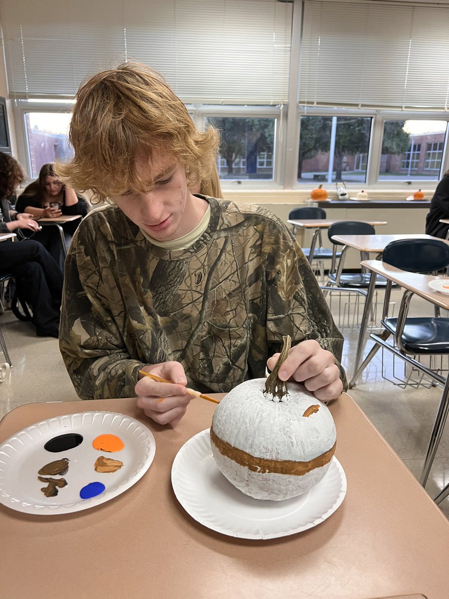 KFHS_West's tweet photo. @Quinlancourt1 junior advisory is hard at working painting pumpkins for a contest. WHO WILL WIN? #wearefirebirds https://t.co/9NdjXsgVFM