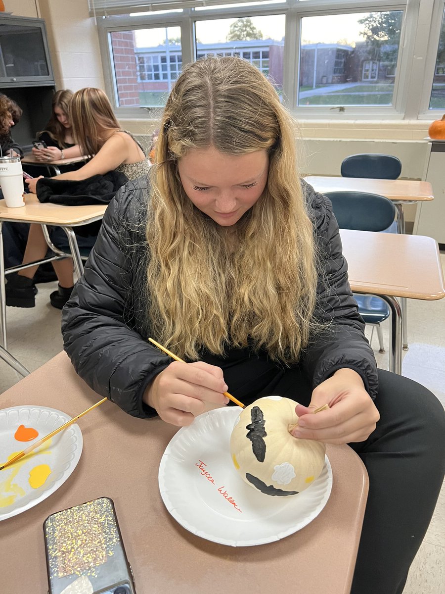 KFHS_West's tweet photo. @Quinlancourt1 junior advisory is hard at working painting pumpkins for a contest. WHO WILL WIN? #wearefirebirds https://t.co/9NdjXsgVFM