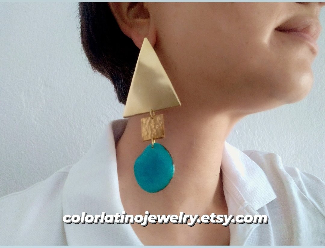 Early deals! Statement gold earrings with turquoise tagua nut  avail at colorlatinojewelry.etsy.com/listing/100675… #largeearrings  #taguajewelry #turquoiseearrings #triangleearrings #tribalstyle #festiveetsyfinds #tribalearrings  #handmadeearrings #etsyus #etsyde #colorlatinojewelry