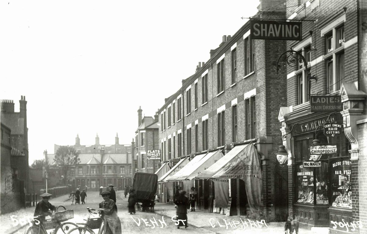 Venn Street, off Clapham High Street, was built over the network of alleyways and courts that made up the original Clapham Rectory Estate at the end of the nineteenth century, replacing many of the original cottages with Victorian terraces and shops of the sort seen here c1915.