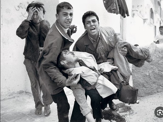 MoatAwesome_'s tweet photo. Tomas Hurndall (27 November 1981 – 13 January 2004) was a British photography student, a volunteer for the International Solidarity Movement (ISM), and an activist against the Israeli occupation of the Palestinian territories. On 11 April 2003, he was shot in the head in the Gaza Strip by a (IDF) sniper, Taysir Hayb. Hurndall was left in a coma and died nine months later.

According to witnesses , he was injured while trying to use his body as a shield to protect a group of Palestinian children as he was leading them out of the line of fire, while one of Herndl's colleagues in the International Solidarity Movement said that Tom was killed while hugging a Palestinian child in an attempt to protect her from Israeli fire .

After Herndl's death, the British newspaper The Independent published photos of him and a few words from what he had written five days before his injury, in which he stated:

" In April 2003 I was shot, gas bombs, soldiers tracked me down, sound bombs were fired meters away from me, falling rubble hit me, I was in the path of a ten-ton bulldozer that does not stop. As we got closer, I kept expecting that some part of my body would be hit by an "invisible" force, that it would get shot and that I would feel pain. Hence, I needed tremendous determination to continue"

Israel rejected a British request to investigate elements of Scotland Yard with Tayseer hayeb in the circumstances of the murder of Tom herndell, and hayeb had stated that he opened fire on the demonstration on instructions from his leadership authorized him to direct bullets even at unarmed civilians, and in April 2005 an Israeli military court sentenced Sergeant Tayseer hayeb to eight years in prison

Israel does not respect the Arabs, it did not respect America and it has revealed its secrets to China more than once and we have mentioned this in evidence in thread No. 4 that you can read , Israel does not respect any citizen of any country, Israel is an aggression against the whole world, not only Palestine , Zionism is a treacherous movement that does not respect any laws or any nationality

And my question now is ,For what sin he was killed !