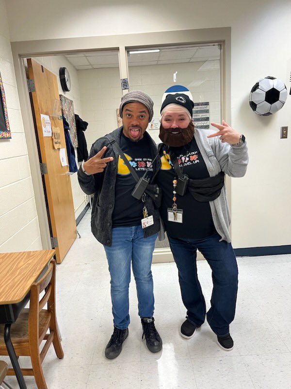 HeatherBrusso's tweet photo. When it’s twin day at your school you and your AP were going to wear the same outfit then you decide to fully commit to the character.  Laughs all around! My beard grew more. @PortCps @cpschoolsva @drjcotton https://t.co/pFtz1lxGA4