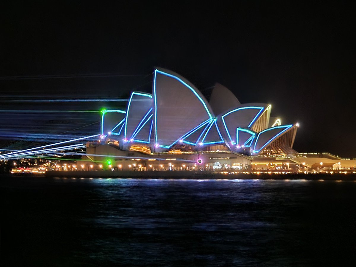 Sydney Opera house at night, a beautiful site and a beautiful city! One interesting thing I learned...No tipping! I tried to tip a bartender and he returned it, " we all get paid well" was his reply.