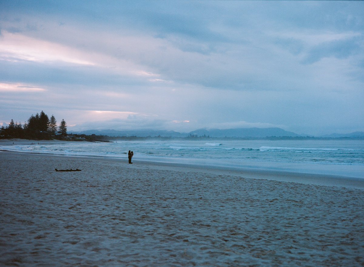 Humans 🤝 Coastal sunset