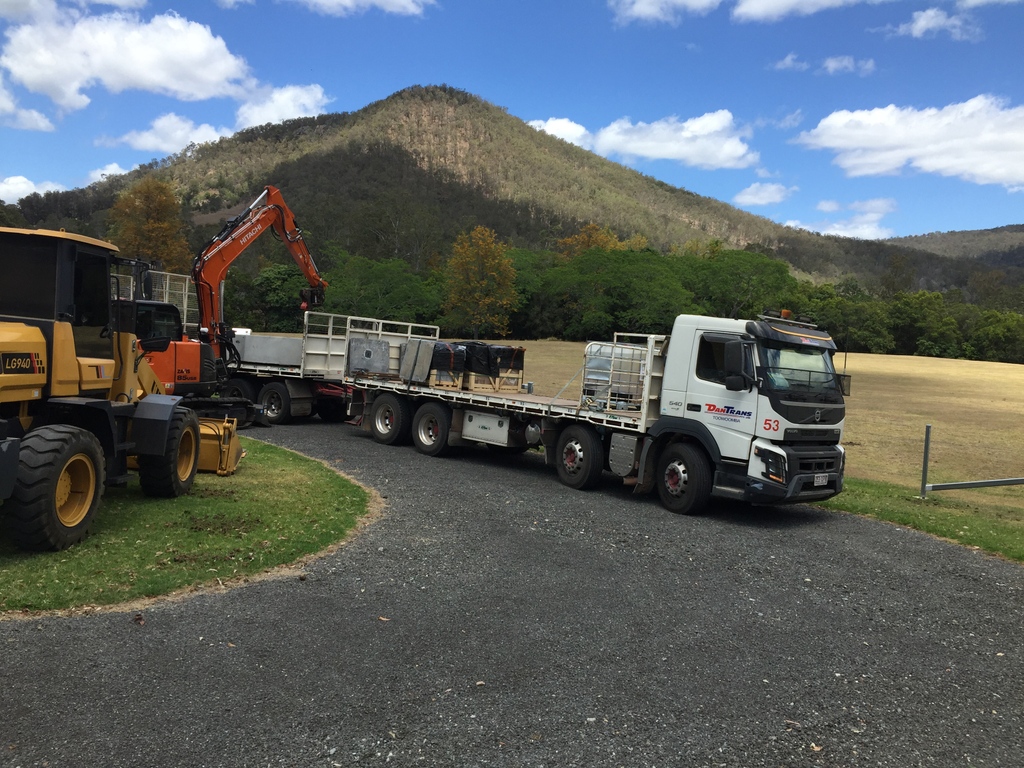 dantransptyltd's tweet photo. Never a dull moment being a Dantrans driver. Every work day is different. Today, Driver Paul is delivering concrete troughs for cattle at Delaneys Creek, DÁguilar.  

https://t.co/rpS2j4V2bY https://t.co/nijq63l6Oq